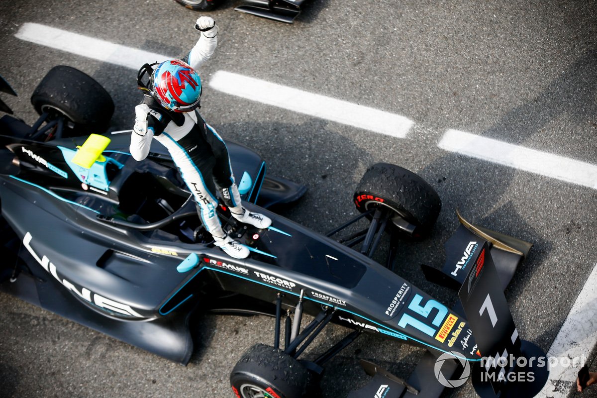 Race Winner Jake Hughes, HWA Racelab celebrates in Parc Ferme