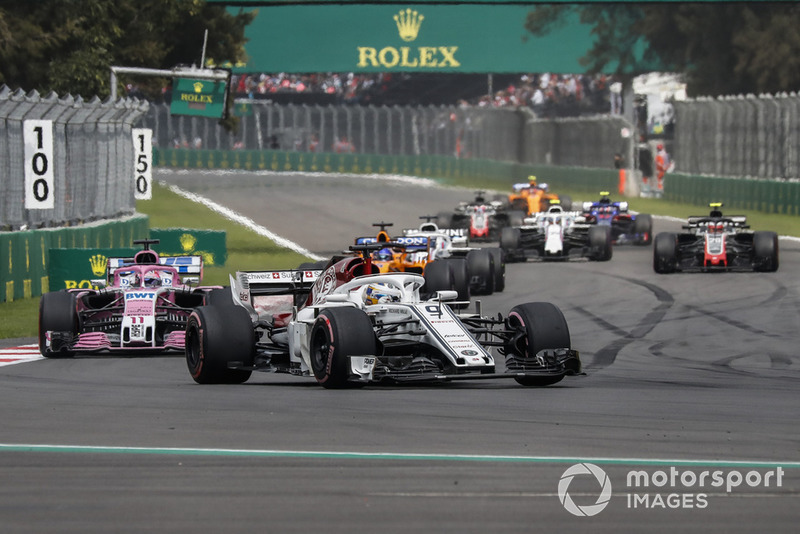 Marcus Ericsson, Sauber C37 and Sergio Perez, Racing Point Force India VJM11