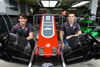 Haas test and development drivers Pietro Fittipaldi and Louis Deletraz pose with a front wing and nose cone