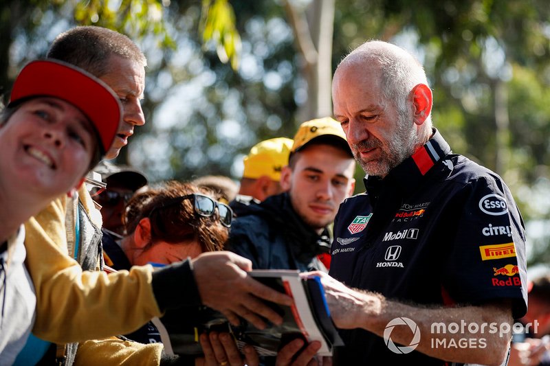 Adrian Newey, Chief Technical Officer, Red Bull Racing signs autographs for fans