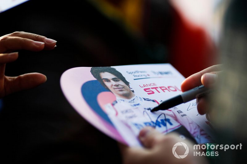 Lance Stroll, Racing Point signs an autograph for a fan