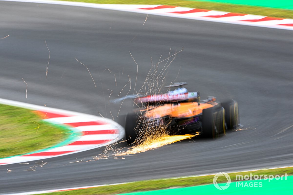 Sparks fly from Daniel Ricciardo, McLaren MCL35M