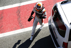 Stoffel Vandoorne, McLaren, walks back to his garage after stopping out on track