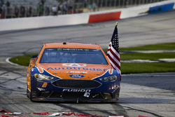 Brad Keselowski, Team Penske Ford, celebrates after winning