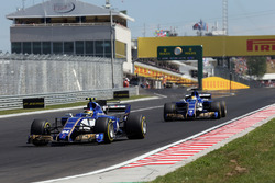 Pascal Wehrlein, Sauber C36 and Marcus Ericsson, Sauber C36