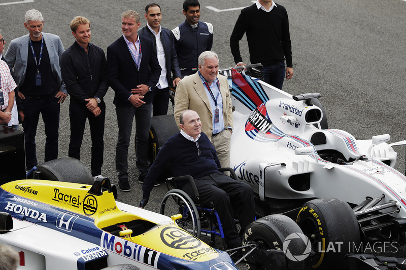 Sir Frank Williams, Patrick Head, a Williams FW40 and FW11 Honda. Behind, Damon Hill, Nico Rosberg, David Coulthard, Pastor Maldonado, Karun Chandhok and Alex Wurz