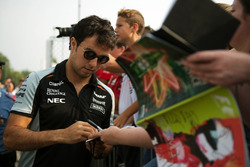 Sergio Perez, Sahara Force India F1 signs autographs for the fans