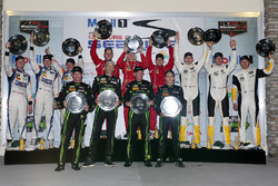 Class podium: DP winners Johannes van Overbeek, Scott Sharp, Ed Brown, Pipo Derani, ESM Racing, PC winners Jon Bennett, Colin Braun, Mark Wilkins, CORE autosport, GTLM winners Oliver Gavin, Tommy Milner, Marcel Fässler, Corvette Racing, GTD winners Christina Nielsen, Alessandro Balzan, Jeff Segal, Scuderia Corsa