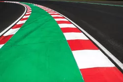 The final corner and pit entry