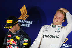 Race winner Nico Rosberg, Mercedes AMG F1 (Right) celebrates on the podium with second placed Daniel