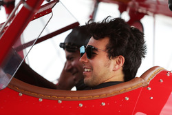 Sergio Perez, Sahara Force India F1 takes a flight in a biplane