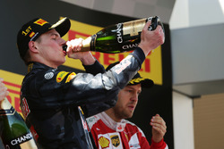 Race winner Max Verstappen, Red Bull Racing celebrates with the champagne on the podium
