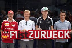 (L to R): Sebastian Vettel, Ferrari; Nico Rosberg, Mercedes AMG F1; Nico Hulkenberg, Sahara Force In