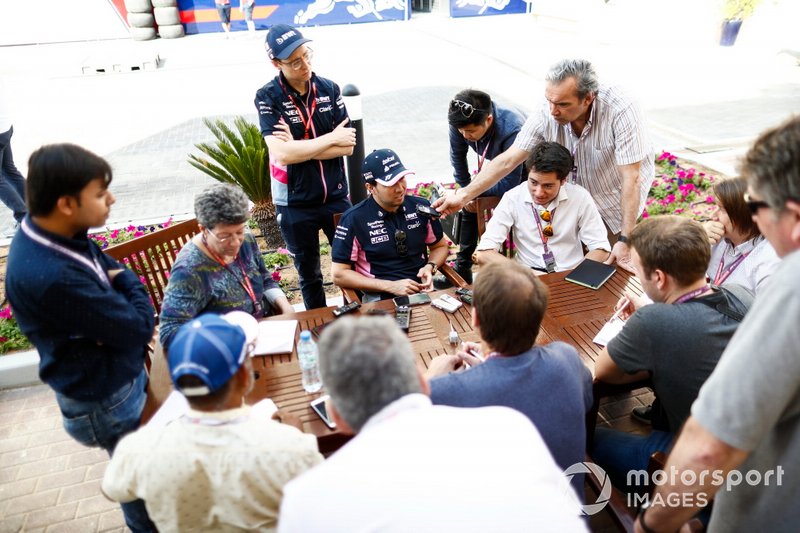 Sergio Perez, Racing Point, talks to the media