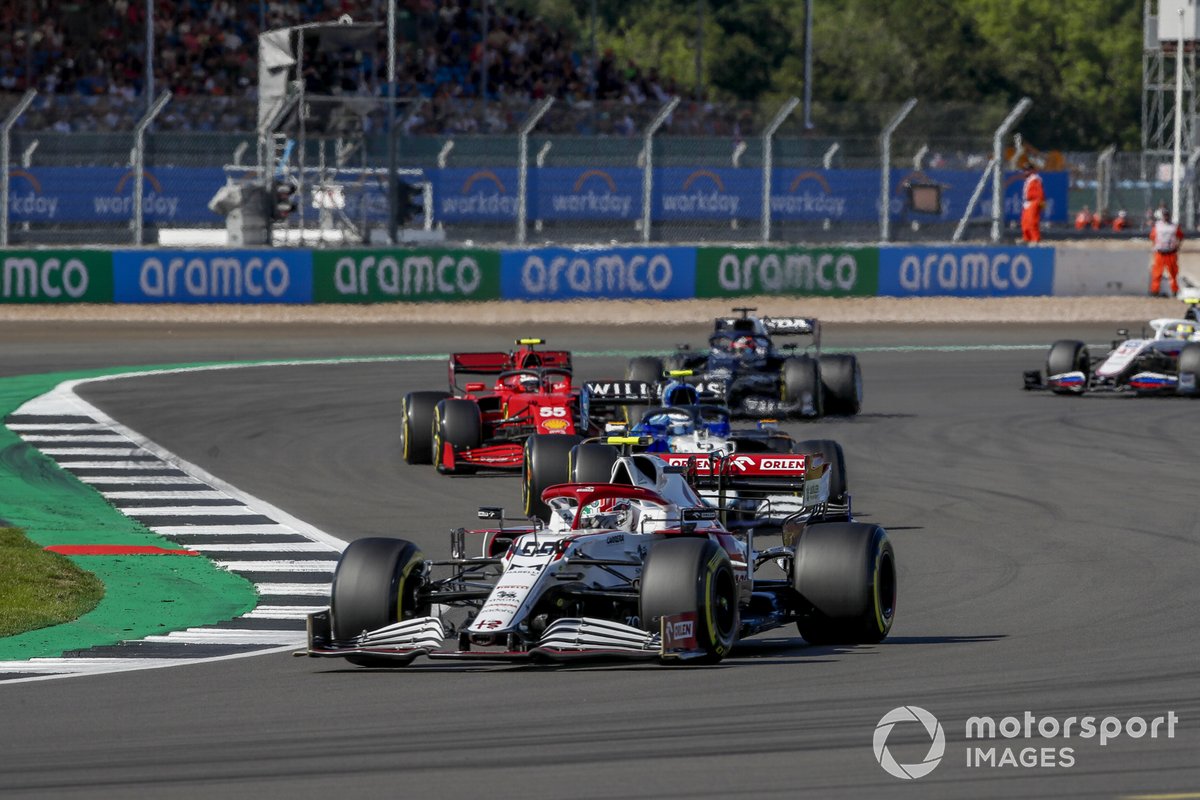 Antonio Giovinazzi, Alfa Romeo Racing C41, Nicholas Latifi, Williams FW43B, and Carlos Sainz Jr., Ferrari SF21