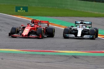 Sebastian Vettel, Ferrari SF90, leads Lewis Hamilton, Mercedes AMG F1 W10
