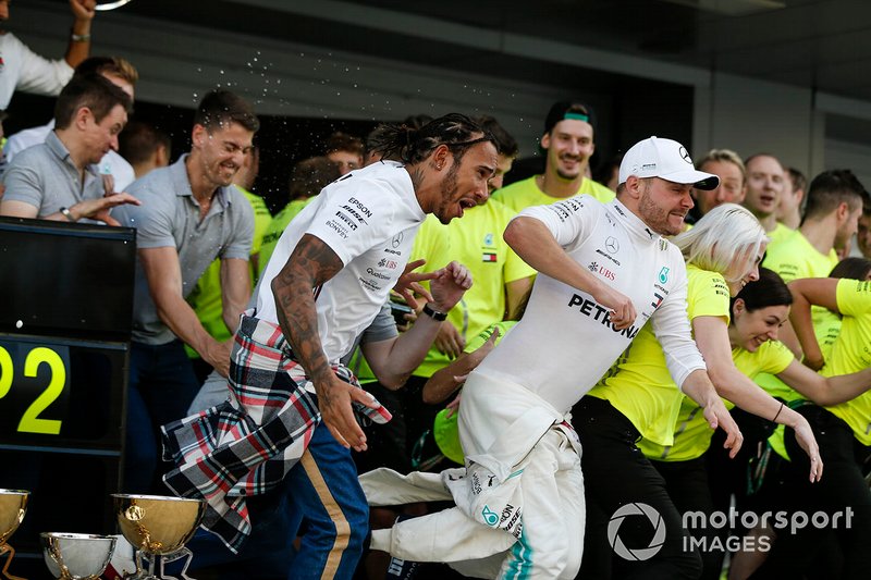 Valtteri Bottas, Mercedes AMG F1, 2nd position, Lewis Hamilton, Mercedes AMG F1, 1st position, and the Mercedes team celebrate a perfect result
