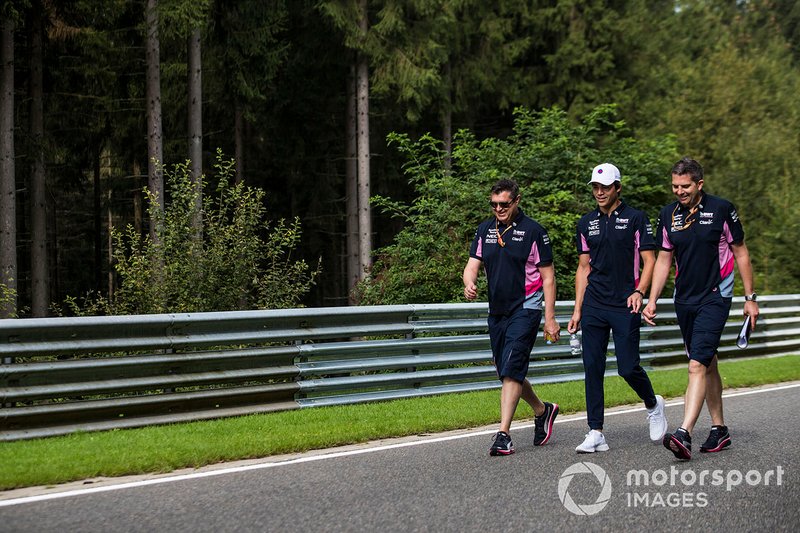 Lance Stroll, Racing Point, walks the track with colleagues