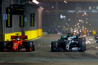 Sebastian Vettel, Ferrari SF90 and Lewis Hamilton, Mercedes AMG F1 W10 battle