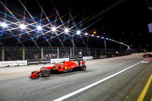 Sebastian Vettel, Ferrari SF71H, leads Max Verstappen, Red Bull Racing RB14