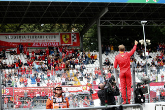 Sebastian Vettel, Ferrari waves to the fans
