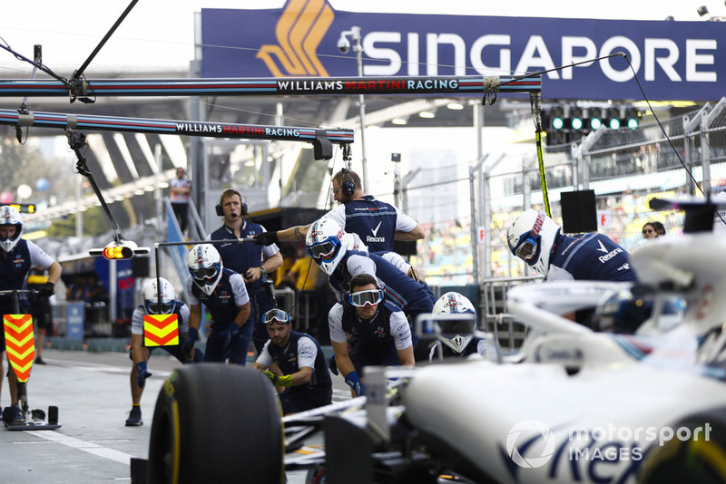Lance Stroll, Williams FW41, approaches his pit area