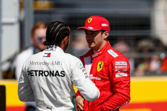 Pole Sitter Lewis Hamilton, Mercedes AMG F1 and Charles Leclerc, Ferrari speak with Paul di Resta, Sky, TV in Parc Ferme