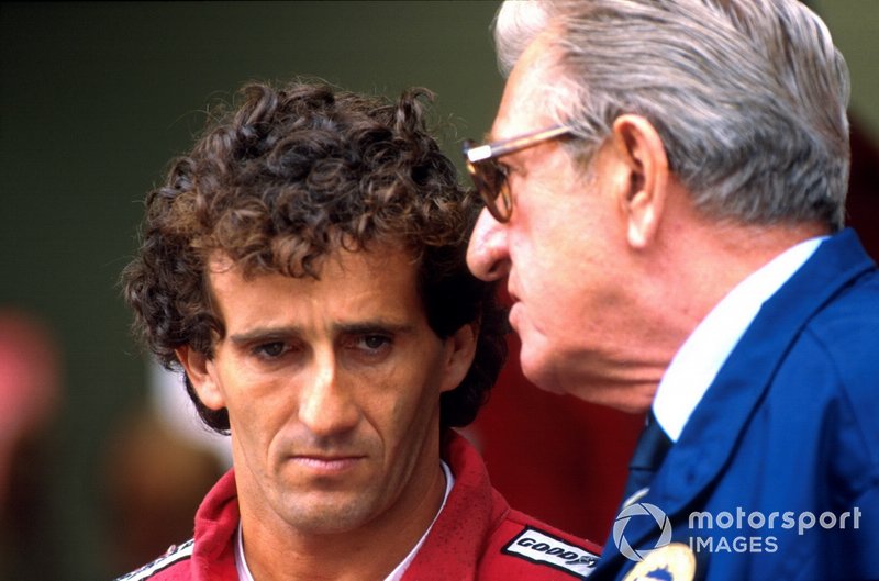 Alain Prost, McLaren talking with FISA President Jean-Marie Balestre