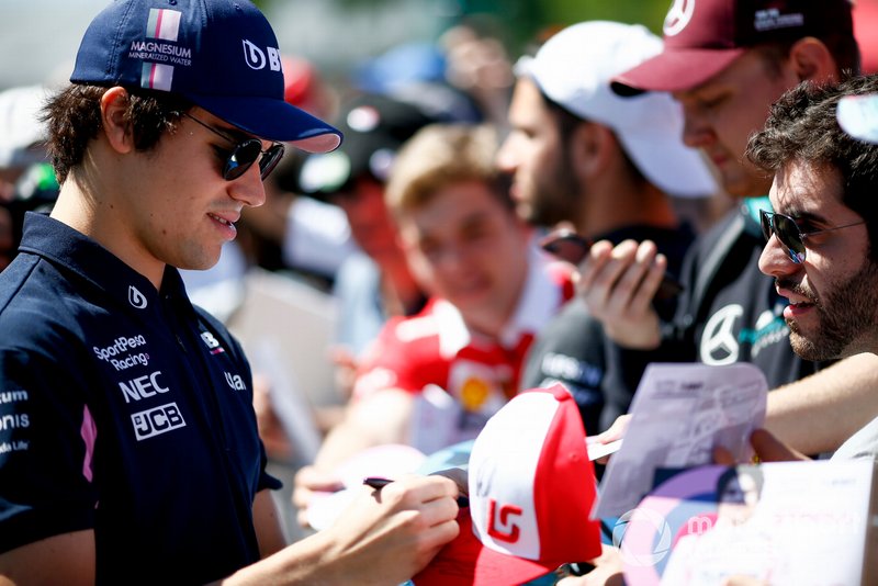 Lance Stroll, Racing Point signs a autograph for a fan