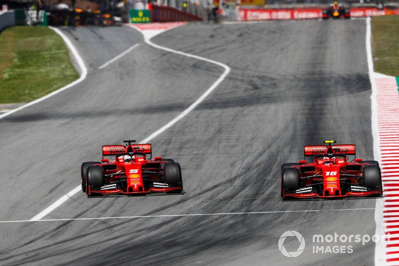 Sebastian Vettel, Ferrari SF90, battles with Charles Leclerc, Ferrari SF90