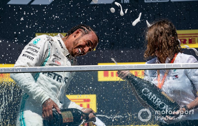 Lewis Hamilton, Mercedes AMG F1, 1st position, sprays Champagne on the podium