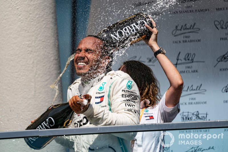 Lewis Hamilton, Mercedes AMG F1, 1st position, celebrates on the podium with his team mate
