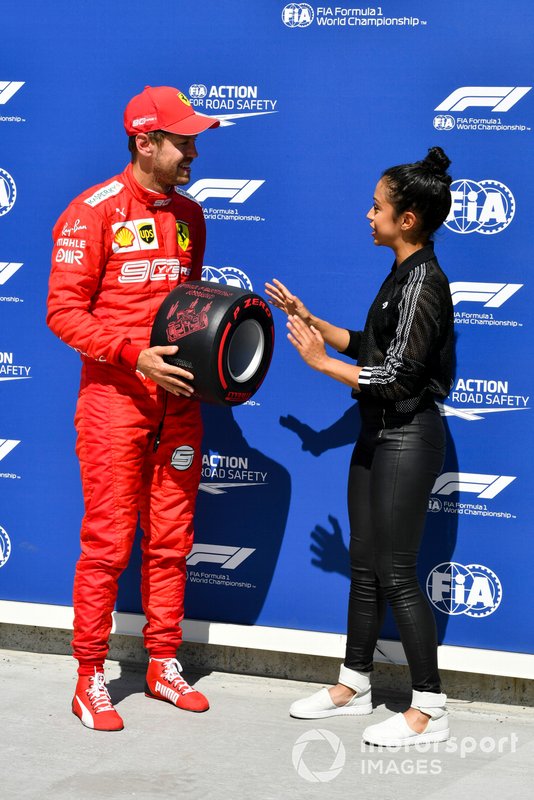 Sebastian Vettel, Ferrari, receives his Pirelli Pole Position Award from actress Liza Koshy