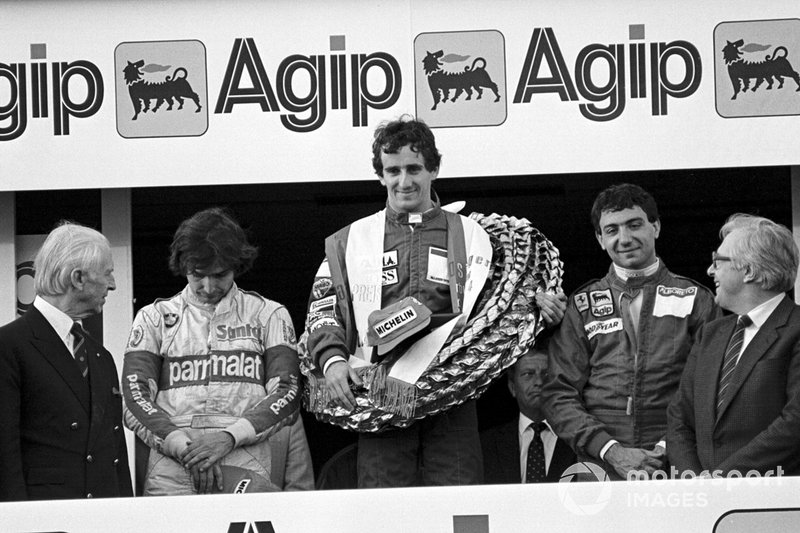 The podium: Nelson Piquet, Brabham third; Alain Prost, McLaren winner; Michele Alboreto, Ferrari second