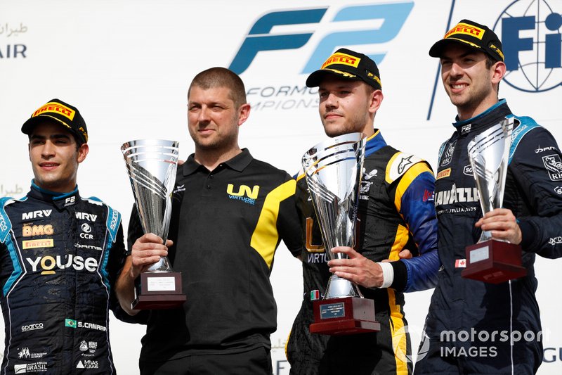 Sergio Sette Camara, DAMS, Luca Ghiotto, UNI VIRTUOSI, and Nicholas Latifi, DAMS, ceebrate on the podium