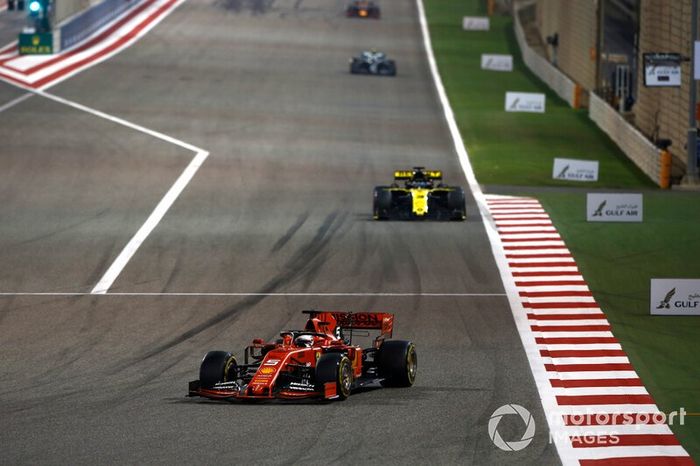 Sebastian Vettel, Ferrari SF90, leads Daniel Ricciardo, Renault R.S.19
