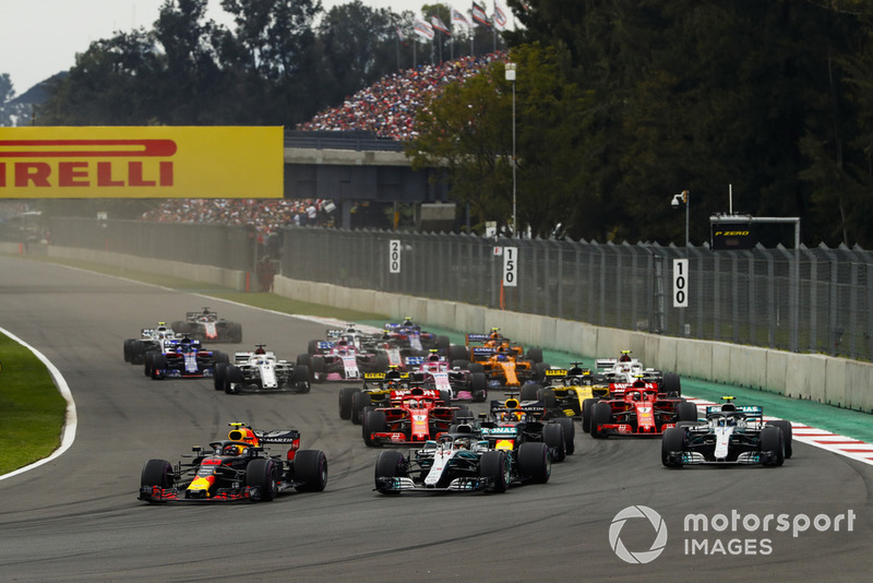 Max Verstappen, Red Bull Racing RB14, leads Lewis Hamilton, Mercedes AMG F1 W09 EQ Power+, Max Verstappen, Red Bull Racing RB14, and Valtteri Bottas, Mercedes AMG F1 W09 EQ Power+, at the start of the race