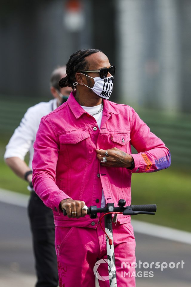 Lewis Hamilton, Mercedes-AMG F1 on a scooter walks the track