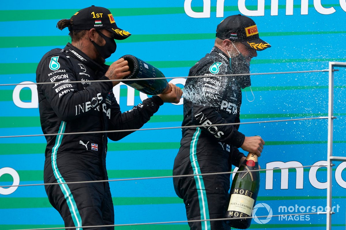 Lewis Hamilton, Mercedes-AMG Petronas F1, and Valtteri Bottas, Mercedes-AMG Petronas F1 on the podium