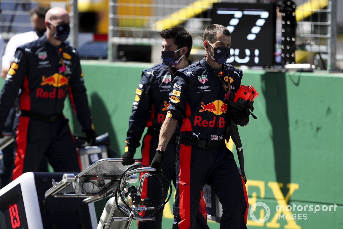 Red Bull team members on the grid