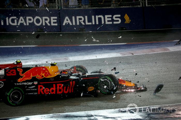 The cars of Kimi Raikkonen, Ferrari SF70H and Max Verstappen, Red Bull Racing RB13 crash and collide
