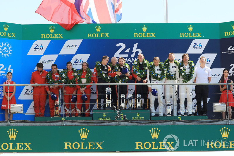 GTE AM podium: first place Robert Smith, Will Stevens, Dries Vanthoor, JMW Motorsport, second place 