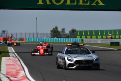 Safety car leads the field