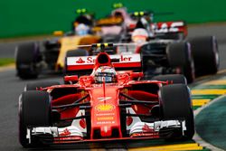 Kimi Raikkonen, Ferrari SF70H, leads Kevin Magnussen, Haas F1 Team VF-17