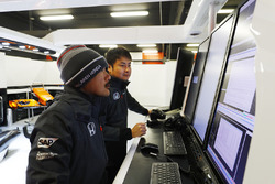 Honda team members examine data
