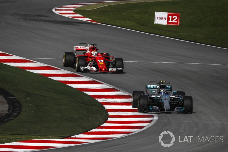 Valtteri Bottas, Mercedes-Benz F1 W08  and Sebastian Vettel, Ferrari SF70H