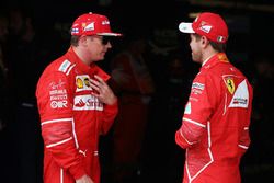 Kimi Raikkonen, Ferrari, with Sebastian Vettel, Ferrari