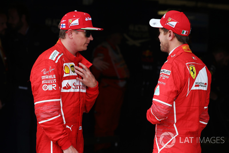 Kimi Raikkonen, Ferrari, with Sebastian Vettel, Ferrari