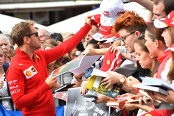 Sebastian Vettel, Ferrari signs autographs for the fans