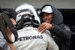 Lewis Hamilton, Mercedes AMG F1, congratulates team mate Valtteri Bottas, Mercedes AMG F1, on securing pole